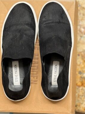 Steve Madden women Black Slip-On suede slip/on sneakers with White Trim